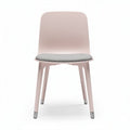 Plastic dining chair with fabric seat in light pink 45 x 50 x 80cm