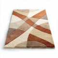 Abstract geometric area rug in shades of brown and cream 150 x 100 x 1cm